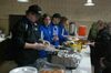 GMR Robotics team members Vincent Stenberg, Byrlie Kjersten, Quinn Pittman, and Jalyssa Gust help serve a turkey meal at the team’s World fundraiser at the Greenbush American Legion on April 2. The team qualified for the FIRST Robotics World Championship event, to be held in Houston, April 19-22. (photo by Ryan Bergeron)