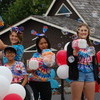 Noella, Nils (front), Kelly (back), Ket, and Ava Christianson either sit or shoot bubbles aboard the KC’s Country Market float in last year’s Greenbush Fourth of July Parade. (photo by Ryan Bergeron)