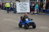 Croix Babcock drives this mini vehicle through the Goose Fest Parade on September 23, representing the Lil’ Gator GMR Early Childhood Family Education. (photo by Ryan Bergeron)