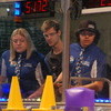 Gator Robotics driver Berlyn Burkel, mentor John Langaas, and driver Sawyer Strand work through a qualification match on March 10, 2023 at the FIRST Robotics Great Northern Regional from the Alerus Center in Grand Forks. The Gator Robotics team used its strengths and during alliance selection found teams to partner with that would complement one another’s strength, ending in playoff success and a regional win. (photo by Ryan Bergeron)