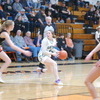 Jaci Hanson prepares to stop with the ball while looking for a teammate to pass to during the second half of the Gators’ 48-42 road win over the Warren-Alvarado-Oslo Ponies in Warren on February 23. (photo by Ryan Bergeron)