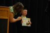 GMR kindergarten graduate Ren Wiskow (right) smiles for a photo after receiving his diploma from his teacher Elizabeth Brandon (left) during the GMR kindergarten graduation in the school gym on May 12. (submitted photo)
