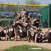 Teagan Landsrud gets congratulated by her Gator teammates after she hit a solo home run over the left field fence in the fifth inning, providing the difference in the Gator Softball team’s 1-0 home playoff victory over the East Polk North Stars on May 25. With the win, the top-seeded and third-ranked Gator Softball team would advance to the section semifinals at home versus the second-seeded and sixth-ranked Red Lake Falls Eagles on May 30. (photo by Ryan Bergeron)