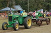 Merle Lorenson hauled his wooden tractor using his 1937 AR John Deere tractor during a parade on September 9, as part of the Fifty-Ninth Annual Northland Threshing Bee held in rural Strathcona on September 9 and 10. (photo by Ryan Bergeron)